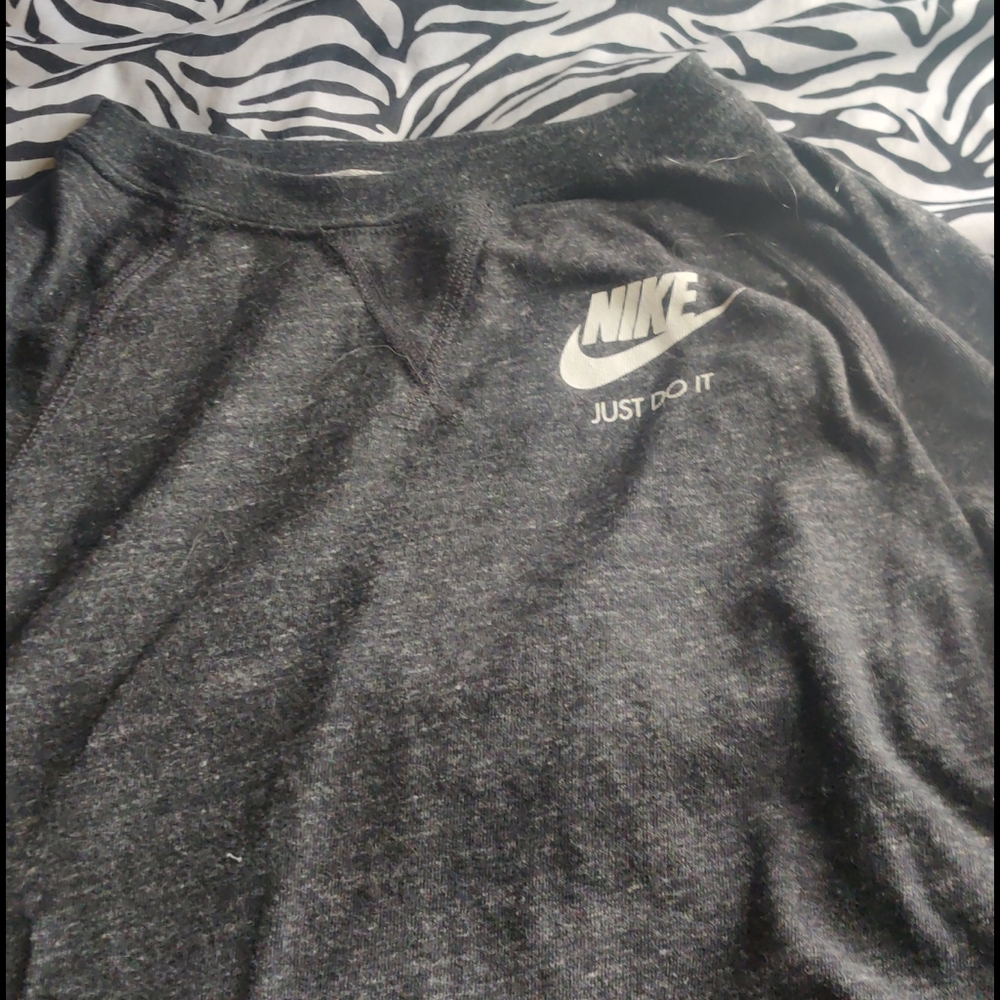A crew neck long-sleave top